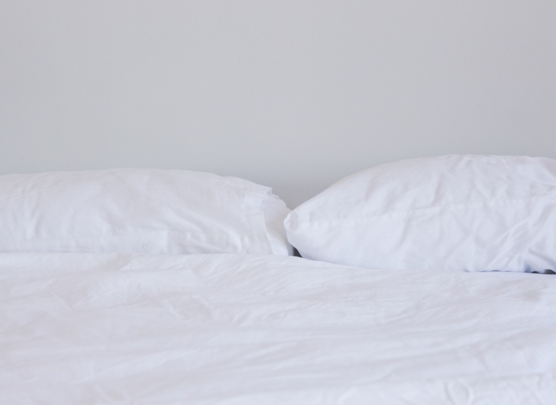 bed with white linen