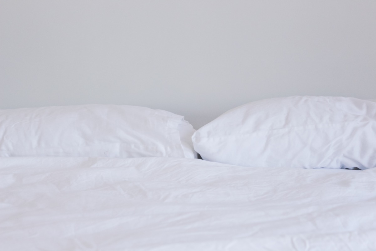 bed with white linen