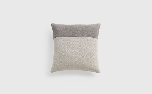 White/grey throw pillow