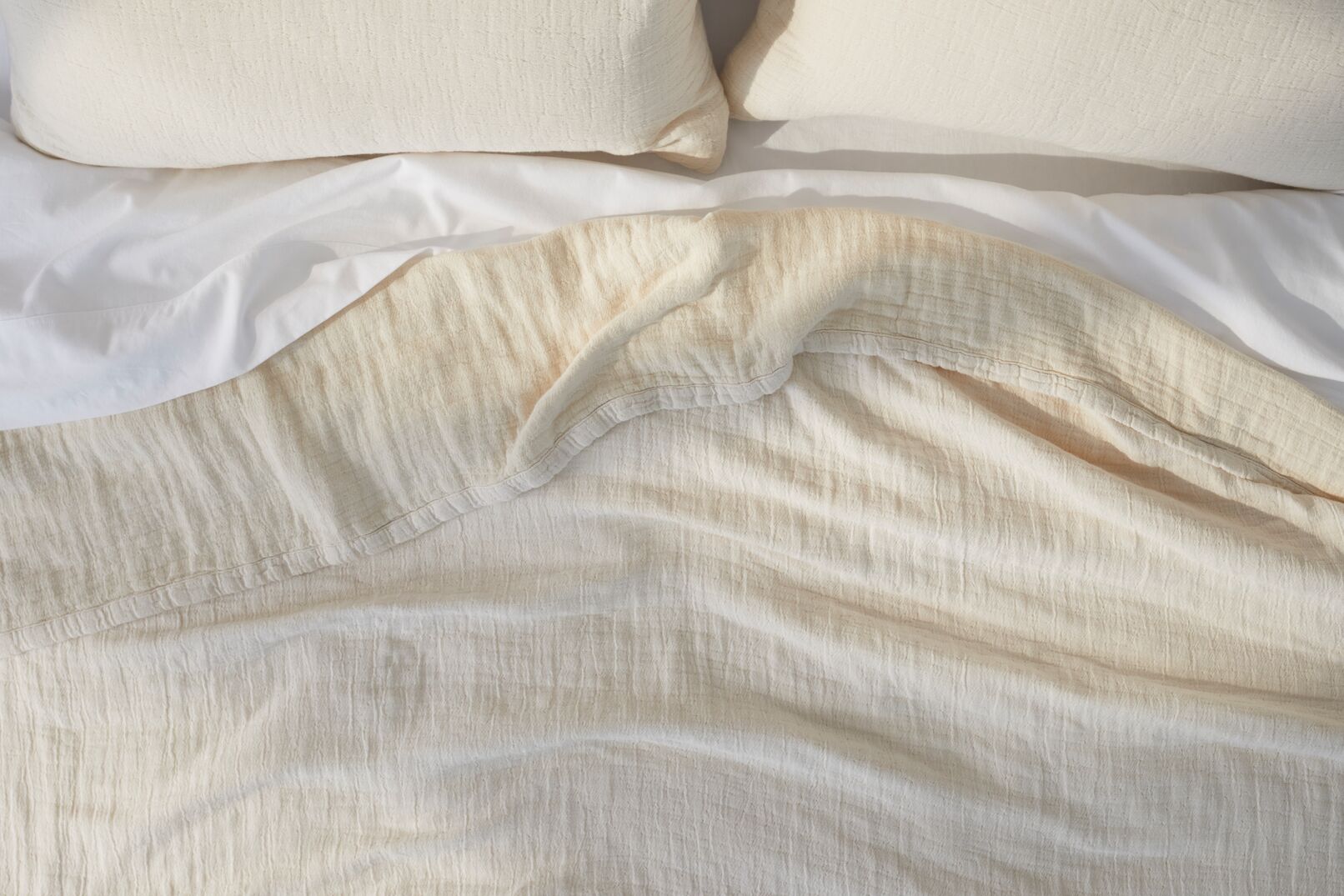 cream-matelasse-coverlet-on-bed