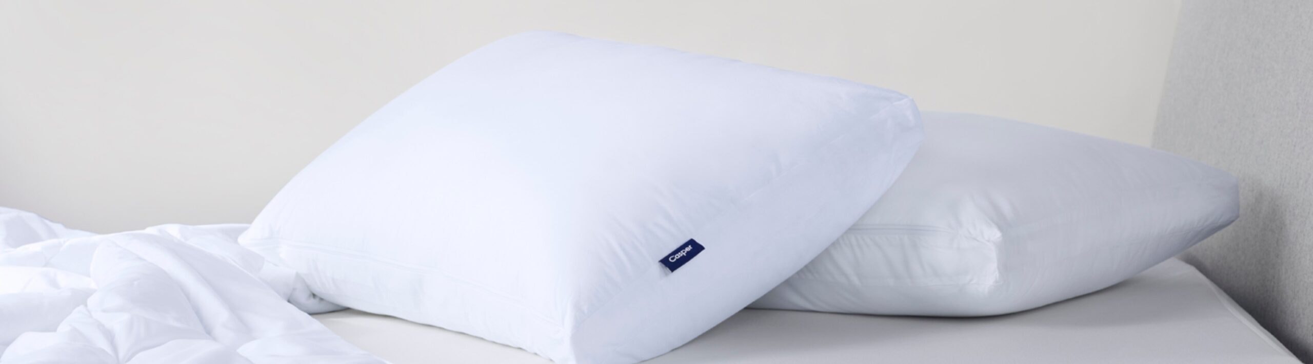 White pillow on the bed