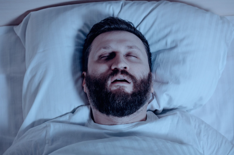 Man sleeping with his mouth open